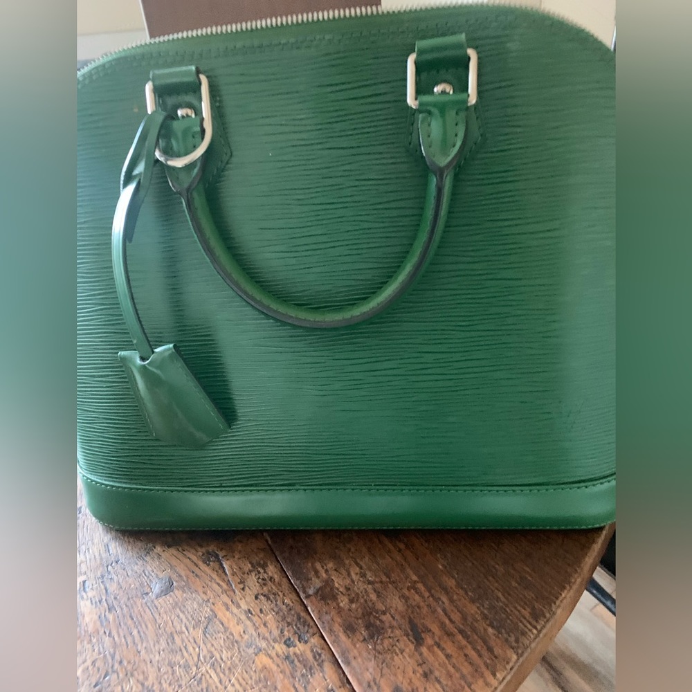 Louis Vuitton Epi Alma Handle Bag.
